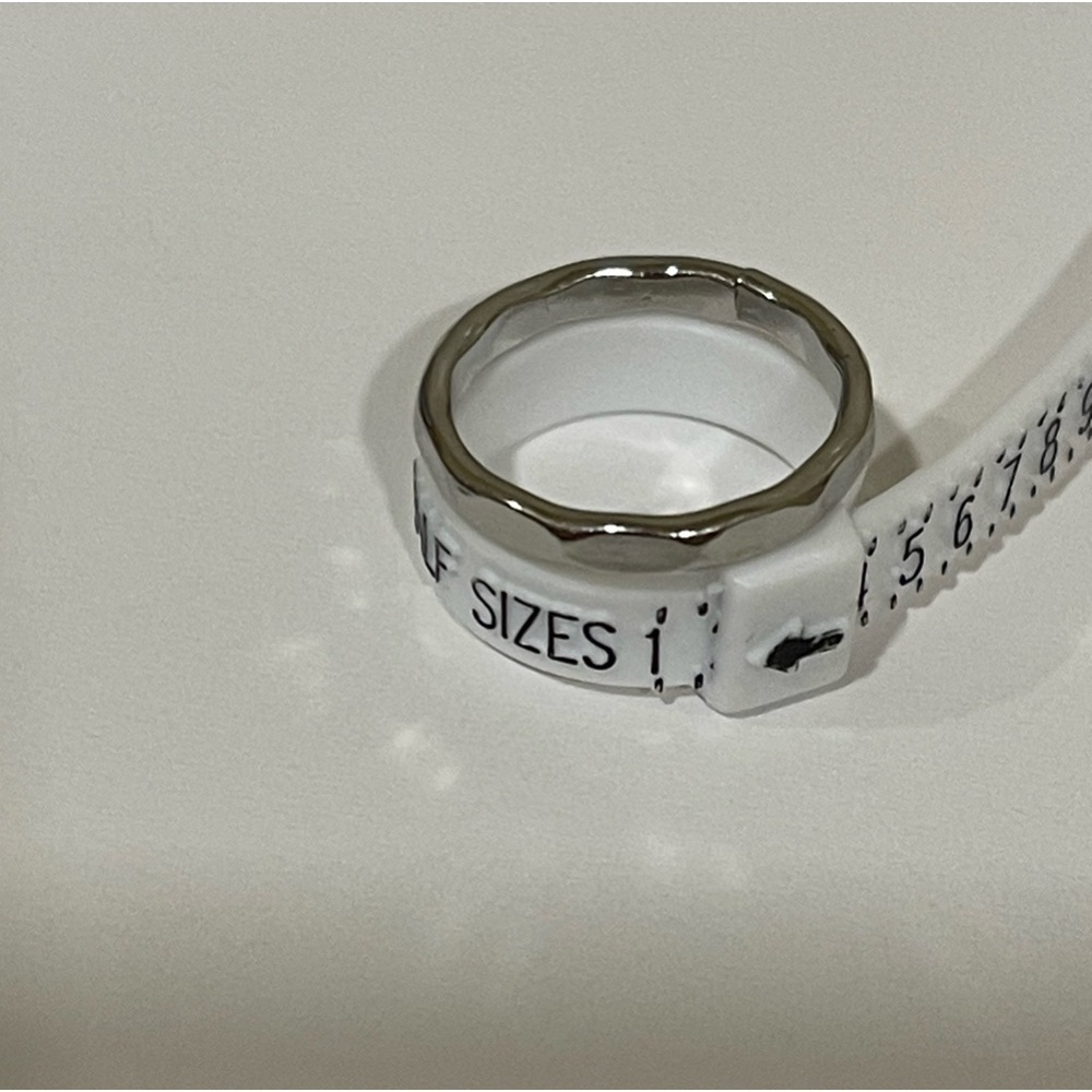 Silver toned hammered ring​​​​​​​​